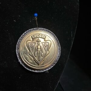 Gucci Gold Button